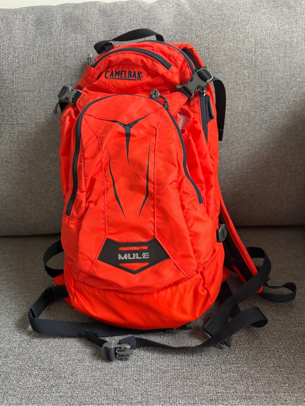 CamelBak Mule Hydration Backpack in Bright Orange with Black Accents
